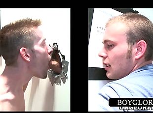 Cute guy gets gay blowjob on gloryhole